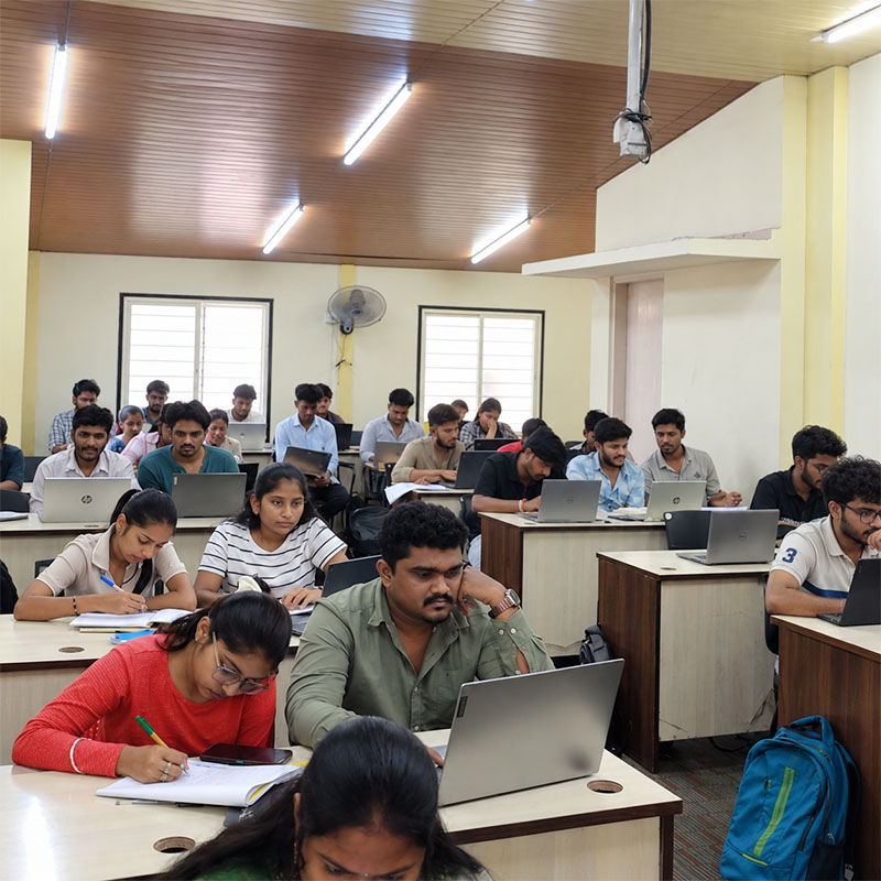 Students working on a real-life project bootcamp at ScholarLogic